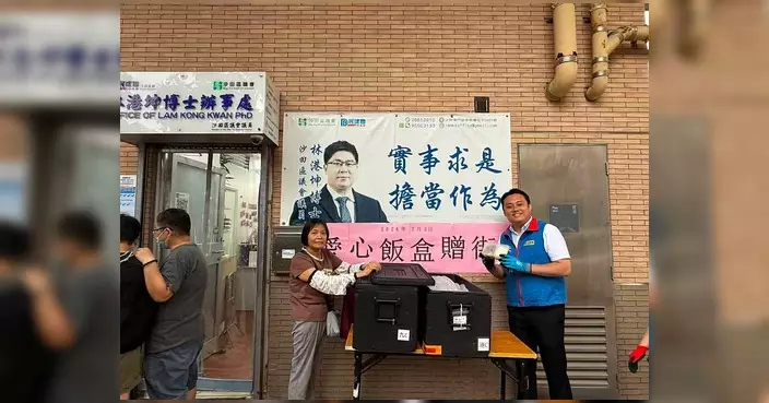 朱煥釗聯同林港坤派愛心飯盒 提醒街坊注意流感