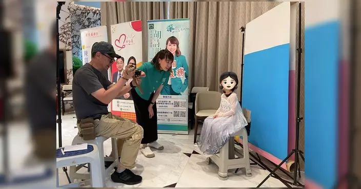 胡詩韻團隊維港滙推證件相拍攝便民服務 居民大讚快捷專業