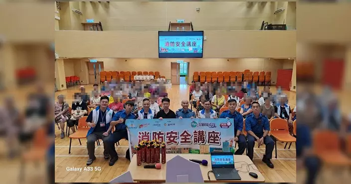 屯門區景峰關愛隊辦消防安全講座 消防員示範使用家庭裝滅火筒