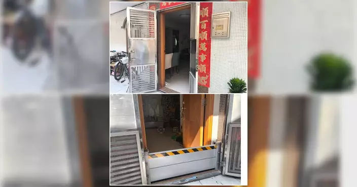 北區上水鄉郊關愛隊為低窪村落住戶安裝可拆式擋水板